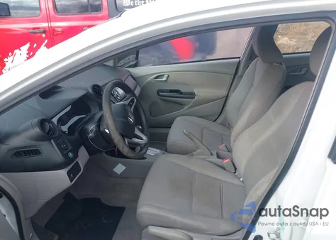 2012 Honda Insight z USA, uszkodzony, nr VIN JHMZE2H3XCS000193